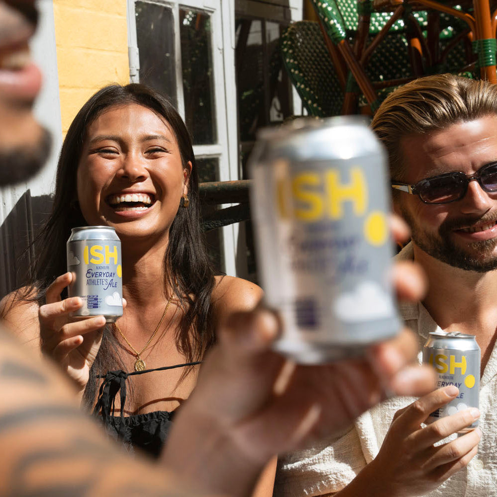 people drinking alcohol-free beer with vitamins and electrolytes