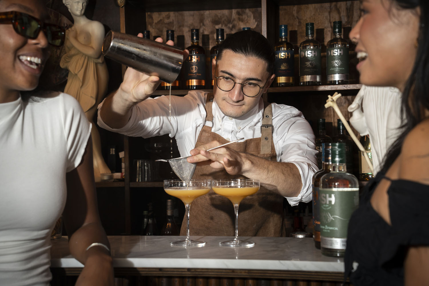 Bartender serving alcohol-free cocktails