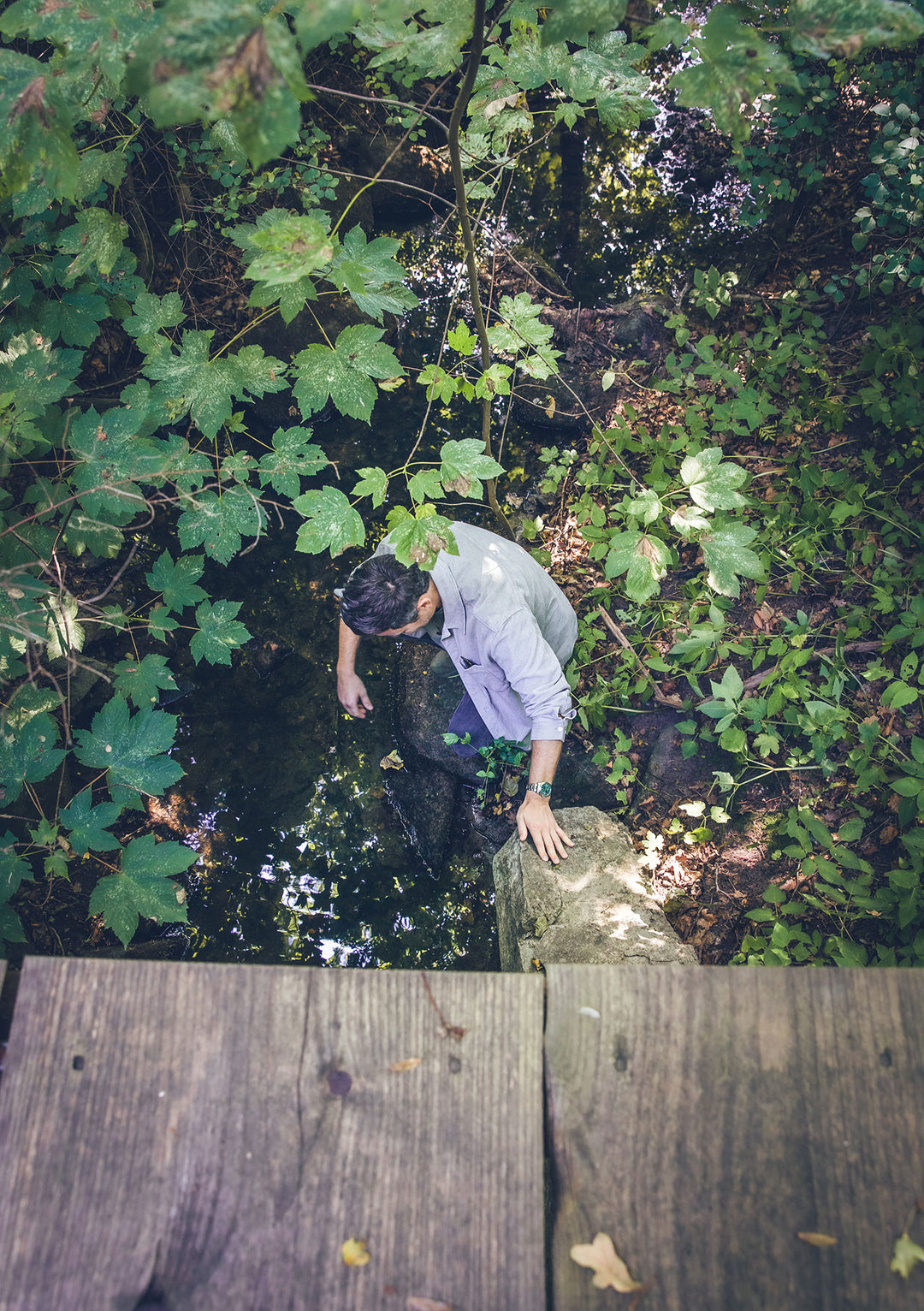 Man in nature by water